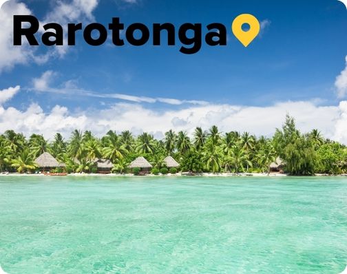 Bungalows on a white sand beach in Rarotonga Cook Islands 